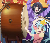 lily banging a drum